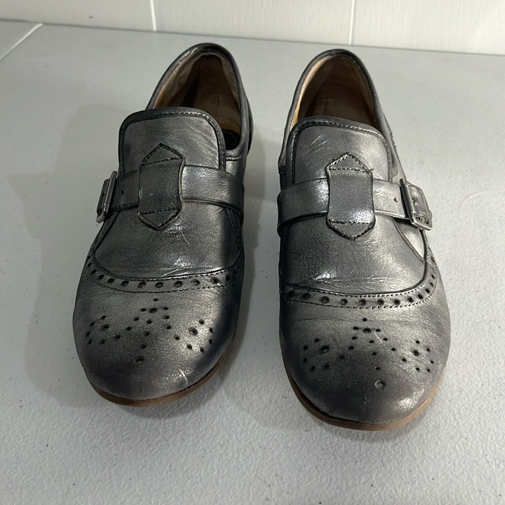 Very stylish distressed silver loafers. Size 8